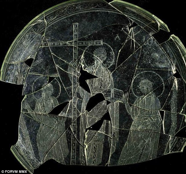 Une plaque de verre avec Jésus au centre